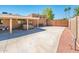 Backyard featuring a hot tub, and a large concrete slab perfect for entertaining at 16425 N 46Th Dr, Glendale, AZ 85306