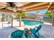 Outdoor lounge area features shade, seating and pool views at 16425 N 46Th Dr, Glendale, AZ 85306