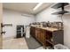 Basement workshop with abundant storage and countertops at 16425 N 46Th Dr, Glendale, AZ 85306