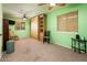 Spacious bedroom featuring neutral carpet, ceiling fan, and large built-in wardrobe at 16425 N 46Th Dr, Glendale, AZ 85306