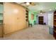 Spacious bedroom featuring neutral carpet, ceiling fan, and large built-in wardrobe at 16425 N 46Th Dr, Glendale, AZ 85306