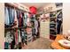 Walk-in closet with custom shelving and ample storage space for organization at 16425 N 46Th Dr, Glendale, AZ 85306