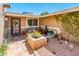 Charming patio area with a decorative door, offering a cozy and private outdoor space at 16425 N 46Th Dr, Glendale, AZ 85306