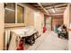Enclosed garage features convenient storage cabinets and work area at 16425 N 46Th Dr, Glendale, AZ 85306