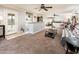 Bright living room with bar, featuring comfortable seating and an open layout connecting to the kitchen at 16425 N 46Th Dr, Glendale, AZ 85306