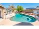 Inviting pool provides a relaxing outdoor retreat with mature landscaping at 16425 N 46Th Dr, Glendale, AZ 85306