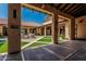 Inviting courtyard with lounge seating, artificial turf, and access to the club shop and tavern at 16747 W Berkeley Rd, Goodyear, AZ 85395