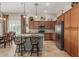 Spacious kitchen with stainless steel appliances, granite counters, and stylish island seating at 16747 W Berkeley Rd, Goodyear, AZ 85395