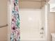 Bathroom with a bathtub, shower, tile, and sink at 17630 N Somerset Dr, Surprise, AZ 85374