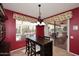 Cozy dining room with backyard views and stylish decor at 17630 N Somerset Dr, Surprise, AZ 85374