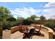 Cozy outdoor firepit area with comfortable seating, perfect for gathering and enjoying evenings outdoors at 17630 N Somerset Dr, Surprise, AZ 85374
