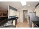 Charming kitchen with granite counters, stainless steel appliances, and tile floors at 17630 N Somerset Dr, Surprise, AZ 85374