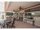 Inviting covered patio with comfortable seating, ceiling fans, and a relaxing atmosphere at 17630 N Somerset Dr, Surprise, AZ 85374