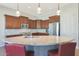 Beautiful kitchen with a large island, granite countertops, stainless steel appliances, and pendant lighting at 17900 W Briarwood Dr, Goodyear, AZ 85338
