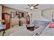 Inviting living room with ceiling fan, and comfortable seating perfect for relaxation and entertaining at 18047 W Caribbean Ln, Surprise, AZ 85388
