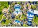 Extensive aerial view showcasing the community's pools, clubhouse, green spaces and lush desert landscaping at 1806 W Fetlock Trl, Phoenix, AZ 85085