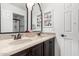 Bathroom with double sinks, granite countertops, and stylish fixtures, creating a luxurious feel at 1806 W Fetlock Trl, Phoenix, AZ 85085