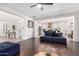 Bright and open living room with hardwood floors and a view of the kitchen at 1806 W Fetlock Trl, Phoenix, AZ 85085