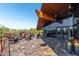 Inviting outdoor patio with stylish seating, offering scenic views and modern design elements at 1806 W Fetlock Trl, Phoenix, AZ 85085
