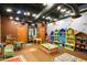 Spacious playroom features colorful decor, playful furniture, and abundant natural light for a cheerful atmosphere at 1806 W Fetlock Trl, Phoenix, AZ 85085