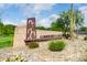 Attractive community center sign featuring modern desert architecture set amongst natural landscaping and clear blue sky at 1806 W Fetlock Trl, Phoenix, AZ 85085