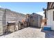 Well-organized backyard with a shed, grill, and a clean, paved patio area at 1914 W Onza Ave, Mesa, AZ 85202