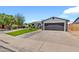 Lovely home with a manicured lawn, stylish walkway, and attached garage at 1914 W Onza Ave, Mesa, AZ 85202