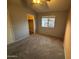 Neutral bedroom featuring closet and windows at 2019 W Lemon Tree Pl # 1124, Chandler, AZ 85224