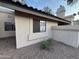 Exterior view of the home with manicured landscaping and desert style hardscape at 2019 W Lemon Tree Pl # 1124, Chandler, AZ 85224