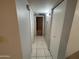 Tiled hallway showcasing access to multiple rooms at 2019 W Lemon Tree Pl # 1124, Chandler, AZ 85224