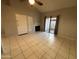 Open living area with sliding doors to the patio and a cozy fireplace at 2019 W Lemon Tree Pl # 1124, Chandler, AZ 85224