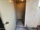 Small utility closet houses the water heater and provides storage space at 2019 W Lemon Tree Pl # 1124, Chandler, AZ 85224