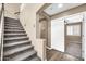 Carpeted stairs lead to the upper level, with an open view to a bedroom at 21054 N Sansom Dr, Maricopa, AZ 85138