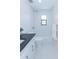 Bright bathroom featuring a tiled shower, toilet, and modern vanity at 214 W Ruth Ave, Phoenix, AZ 85021