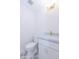 Half bathroom featuring tiled flooring, vanity with marble countertop, and modern fixtures at 214 W Ruth Ave, Phoenix, AZ 85021