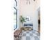 Elegant foyer with checkered tile flooring, stylish decor, and ample natural light creating a sophisticated entrance at 214 W Ruth Ave, Phoenix, AZ 85021