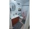 Cozy bathroom featuring neutral tones, a decorative shower curtain, and modern fixtures at 2150 W Alameda Rd # 2037, Phoenix, AZ 85085
