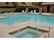 Sparkling community pool and jacuzzi, perfect for relaxing and entertaining while enjoying the warm sunshine at 2150 W Alameda Rd # 2037, Phoenix, AZ 85085