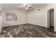 Spacious bedroom featuring wood-look floors, and bright natural light at 2223 E Crest Ln, Phoenix, AZ 85024