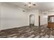 Open-concept space showing the wood-look floors and bright airy living area at 2223 E Crest Ln, Phoenix, AZ 85024
