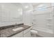Bathroom features a shower/tub combo, granite countertops, and a sink for everyday convenience at 22530 N Lynn St, Maricopa, AZ 85138