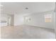 Spacious living area with tile flooring, bright lighting and plentiful natural light at 22530 N Lynn St, Maricopa, AZ 85138