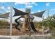 Community playground featuring climbing structure, spiral slide and shade canopies at 22570 N Lynn St, Maricopa, AZ 85138
