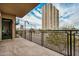 Spacious balcony with views of city buildings and lush landscaping at 2302 N Central Ave # 206, Phoenix, AZ 85004