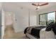 Bedroom features a ceiling fan and an open doorway to an adjoining room at 2302 N Central Ave # 206, Phoenix, AZ 85004
