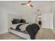 Bedroom featuring a ceiling fan and a doorway to a bathroom at 2302 N Central Ave # 206, Phoenix, AZ 85004