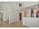 Open-concept dining area with contemporary lighting fixtures and stylish kitchen features at 2302 N Central Ave # 206, Phoenix, AZ 85004