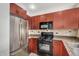 Well-equipped kitchen with stainless steel appliances, granite countertops, and sleek cabinetry at 2302 N Central Ave # 206, Phoenix, AZ 85004