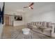 Bright living room with a stylish rug, comfortable couch, and modern lighting at 2302 N Central Ave # 206, Phoenix, AZ 85004