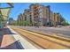 Street view of a well-maintained complex with manicured landscaping and convenient access to public transportation at 2302 N Central Ave # 206, Phoenix, AZ 85004